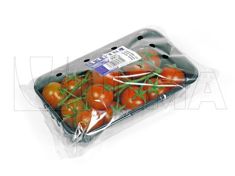 Emballage de tomates cerises en barquette sur une enveloppeuse flow pack (hffs)